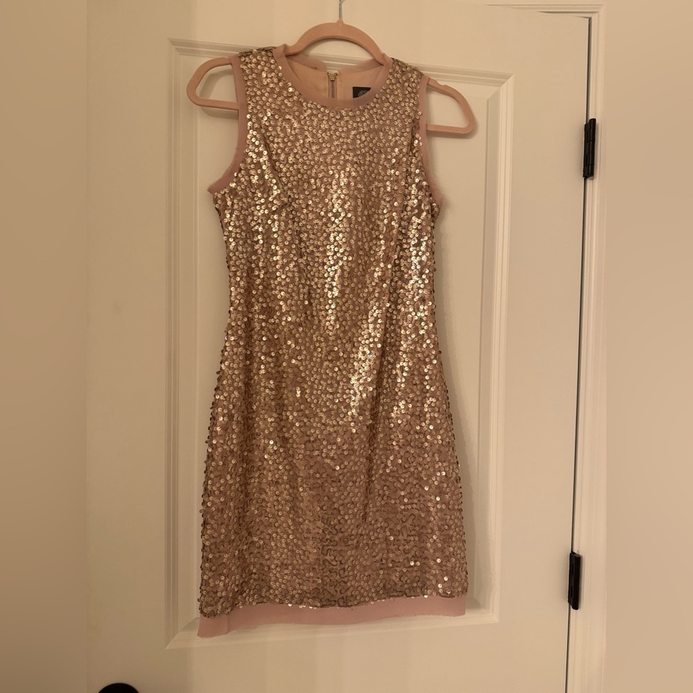 Vince Camuto Rose Gold Sequin Mini Dress
Stunning for any occasion. - Picture 6 of 14